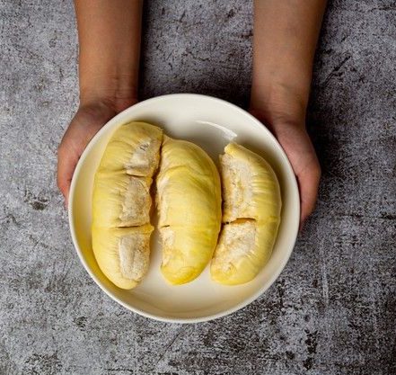 Free Photo _ Fresh durian fruit on the dark surface_